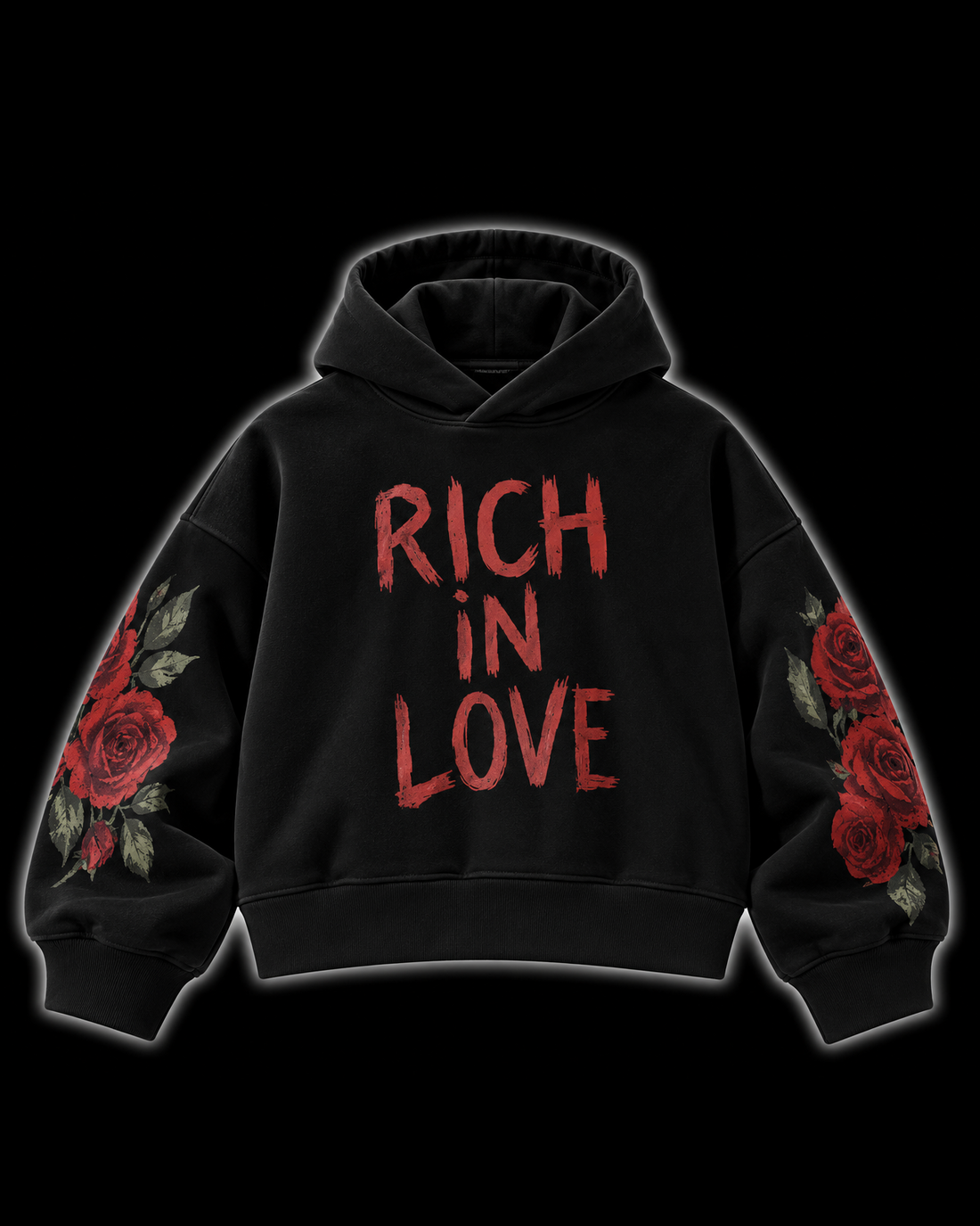 A black pullover hoodie with 'RICH IN LOVE' printed in distressed red letters across the chest, featuring red rose and green leaf illustrations on both sleeves, shown against a solid black background.