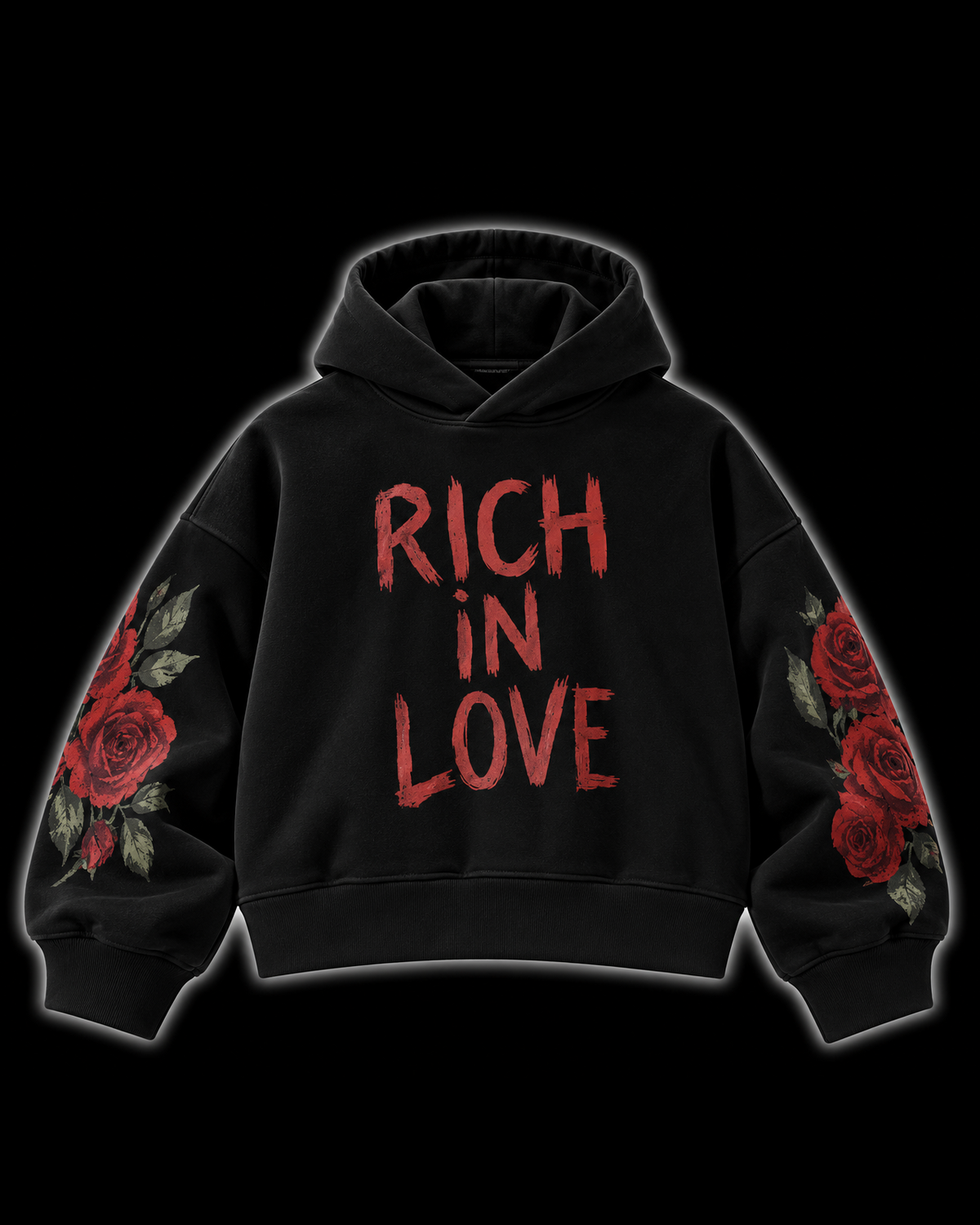 A black pullover hoodie with 'RICH IN LOVE' printed in distressed red letters across the chest, featuring red rose and green leaf illustrations on both sleeves, shown against a solid black background.